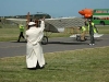 bleriot-look-alike-greeting-his-plane.jpg