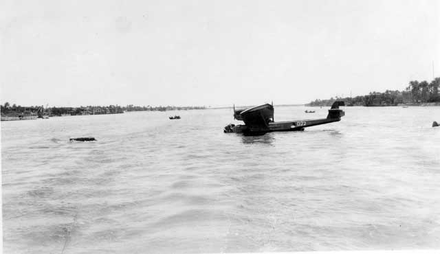 An even rarer shot of the Dutch navy MLD Wal D22 after it was damaged when hitting a ponton bridge after an emergency landing when it hit telephone wires at take off. The picture was taken on 1 May 1929 and shows the D22 half-sunken on the Tigris river near Bagdad. The person sitting in the front place of the hull was tragically killed during this accident. D22 was one of three flying boats making a trip from the Netherlands to the Netherland East Indies. It was left behind at Bagdad and parts of it may even still exist today!