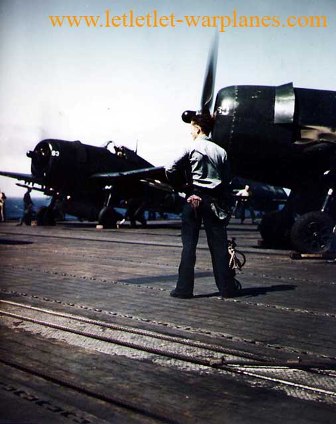 F6F-5 warming up on deck of USS Bennington (CV-20), 1945 [US Navy]