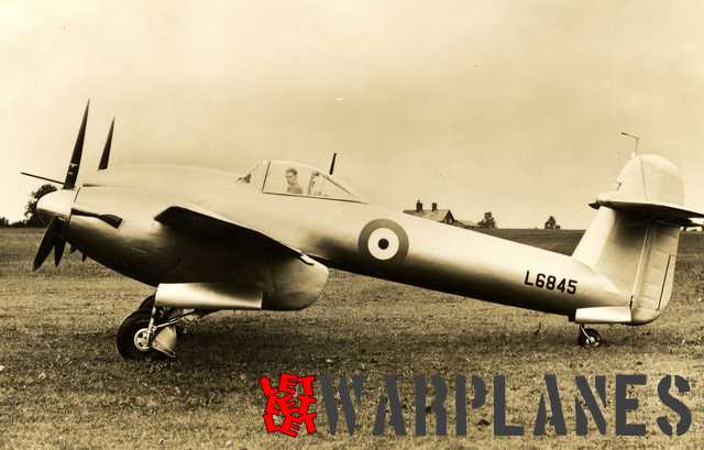 The second prototype L6845 in aluminium colour scheme with Westland chief test pilot Harald Penrose in the cockpit. Note the mudguards fitted on the main wheels. At the production Whirlwind these were omitted. We also see the small acorn shaped filler at the tail that was later enlarged on the production type!