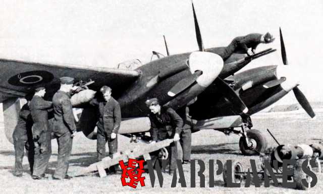 A Whirlwind being loaded with two underwing bombs. Note the position of the person checking the cannons! (Bernhard Klein collection)