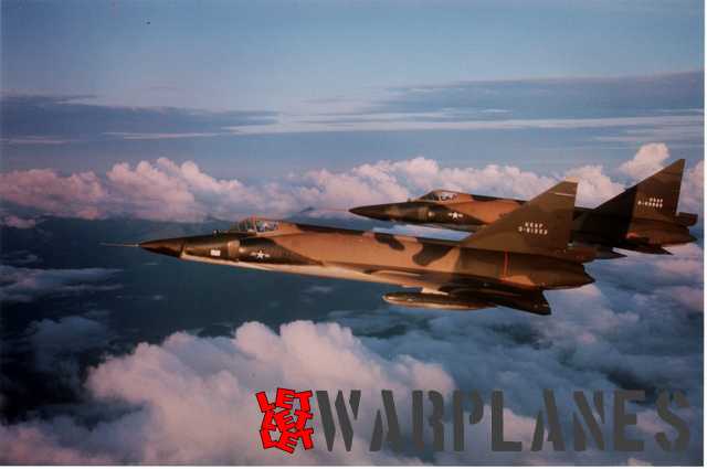 Two multi camouflaged F-102 in flight, they are mostly removed from first line unit and note first letter in registration O which mean Obsolete. Machines featured Case XX wings and underwing tanks.