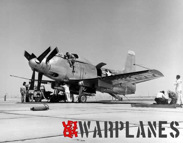 Douglas mechanics working on XA2D-1 no. 2 at Edwards with the engine inspection panel opened