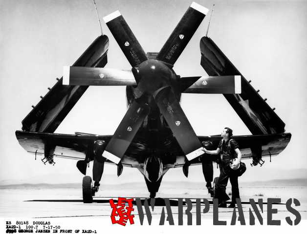 George Jansen is dwarfed by the first XA2D-1. Note the broad-chord Aeroproducts double propeller. It had a diameter of 4.25 m. The photo was taken on 17 July 1950 and shows two long test booms on each wing tip for pressure measurements in undisturbed air.