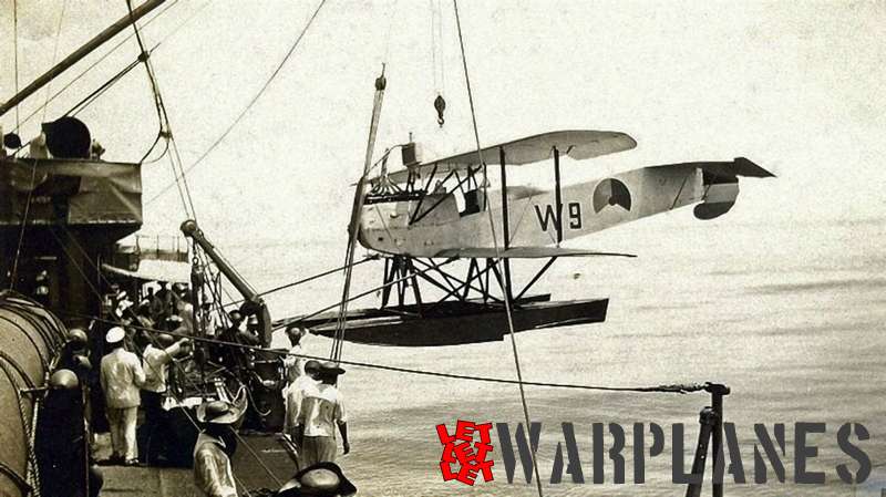 The Van Berkel W-A no. W9 being lowered from the deck of a Dutch warship