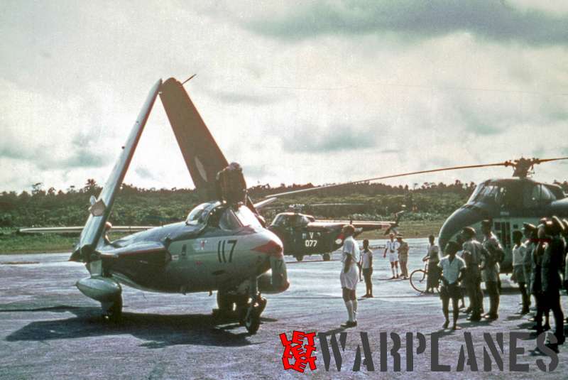 A Dutch MLD Sea Hawk at HATO, Curacao with a Sikorsky S-55 and S-58 helicopter on the background. (Photo: Prudent Staal collection