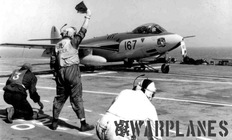 A Seahawk on deck of HMS Albion gets the 'Go' signal from the Deck Officer prior to a launch on the steam catapult. (Dave Smith collection)